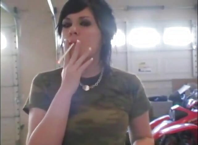Slutty teens smoking a cigarettes in close up video
