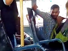 A trka guy gets off on a bus while the girl driver films it