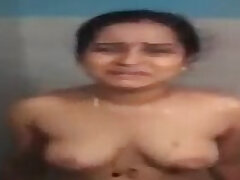 Indian telugu bhabhi bathing nude and dressing.