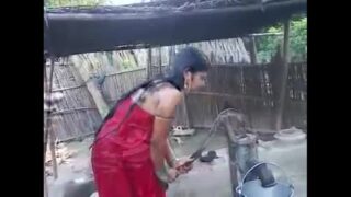 Young bhabhi having outdoor bath