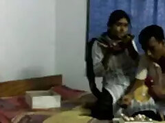 Couple celebrating their wedding day at home