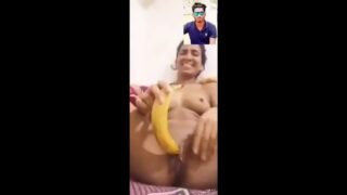 Masturbation with banana by horny girl on a video call