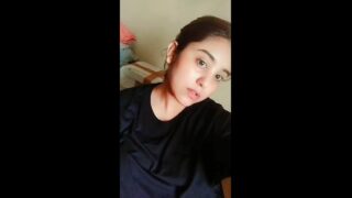 Beautiful girl lifting dress and showing big boobs