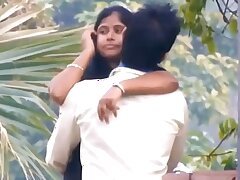 Lovers Smooching in Park