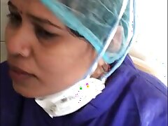 Doctor gives a blowjob to his colleague in front of the camera