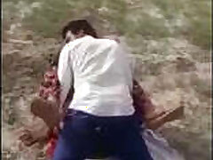 Two men have sex with a Rajasthani woman in an open field