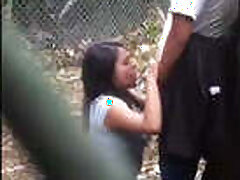 Hot college girl caught sucking big cock in park
