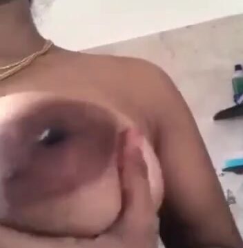 Sexy boobs telugu wife showing her nude body in bathroom